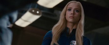 Movie still from “Fantastic Four: Rise of the Silver Surfer” (2007), directed by Tim Story – A woman with blonde hair and blue eyes looking to her left; Close Up shot, Over the shoulder angle