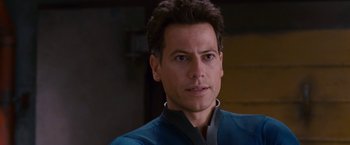 Movie still from “Fantastic Four: Rise of the Silver Surfer” (2007), directed by Tim Story – A person wearing a suit and tie; Close Up shot, Over the shoulder angle