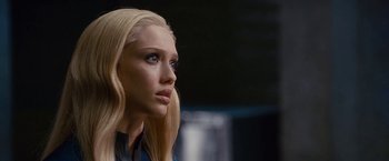 Movie still from “Fantastic Four: Rise of the Silver Surfer” (2007), directed by Tim Story – A woman with blonde hair and blue eyes looking to her left; Close Up shot, Over the shoulder angle