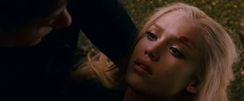 Movie still from “Fantastic Four: Rise of the Silver Surfer” (2007), directed by Tim Story – A woman is blow drying her long blonde hair; Close Up shot, Overhead angle