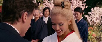 Movie still from “Fantastic Four: Rise of the Silver Surfer” (2007), directed by Tim Story – A beautiful young blond haired woman wearing a kimono; Close Up shot, Over the shoulder angle