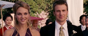 Movie still from “Fantastic Four: Rise of the Silver Surfer” (2007), directed by Tim Story – A man and a woman standing next to each other in front of trees; Close Up shot, Over the shoulder angle