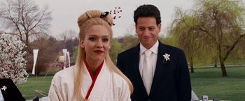Movie still from “Fantastic Four: Rise of the Silver Surfer” (2007), directed by Tim Story – A man and a woman dressed up for a wedding; Close Up shot, Over the shoulder angle