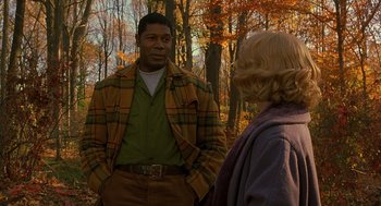Movie still from “Far from Heaven” (2002), directed by Todd Haynes – A man and a woman in the woods talking to each other; Medium shot, Over the shoulder angle