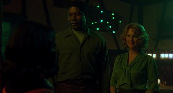 Movie still from “Far from Heaven” (2002), directed by Todd Haynes – A man and a woman standing next to each other; Medium shot, Low angle