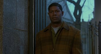 Movie still from “Far from Heaven” (2002), directed by Todd Haynes – A man standing in front of a window; Close Up shot, Over the shoulder angle
