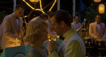 Movie still from “Far from Heaven” (2002), directed by Todd Haynes – A man and a woman dancing at an event; Medium shot, Over the shoulder angle