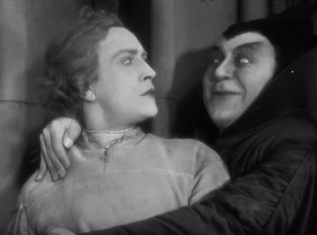 Movie still from “Faust” (1926), directed by F.W. Murnau – A woman and an older woman are hugging; Medium shot, High angle