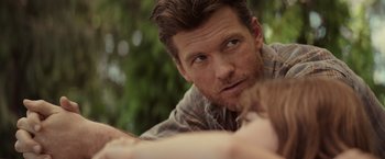 Movie still from “The Shack” (2017), directed by Stuart Hazeldine – A man looking at the camera; Close Up shot, Over the shoulder angle