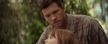 Movie still from “The Shack” (2017), directed by Stuart Hazeldine – A man and a little girl looking at each other; Close Up shot, Over the shoulder angle