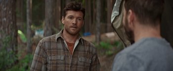 Movie still from “The Shack” (2017), directed by Stuart Hazeldine – A person wearing a plaid shirt; Close Up shot, Over the shoulder angle
