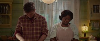 Movie still from “The Shack” (2017), directed by Stuart Hazeldine – A man and a woman standing next to each other in a kitchen; Medium shot, Over the shoulder angle