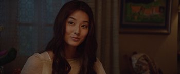 Movie still from “The Shack” (2017), directed by Stuart Hazeldine – A beautiful young woman with long dark brown hair; Close Up shot, Over the shoulder angle