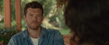 Movie still from “The Shack” (2017), directed by Stuart Hazeldine – A person wearing a jean shirt; Close Up shot, Over the shoulder angle
