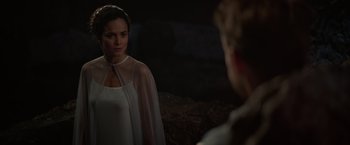 Movie still from “The Shack” (2017), directed by Stuart Hazeldine – A woman in a white dress looking into a mirror; Medium shot, Over the shoulder angle