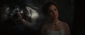 Movie still from “The Shack” (2017), directed by Stuart Hazeldine – A woman standing in front of a smoke filled room; Close Up shot, Over the shoulder angle