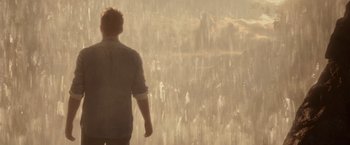 Movie still from “The Shack” (2017), directed by Stuart Hazeldine – A man standing in front of a large window; Wide shot, Low angle