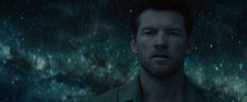 Movie still from “The Shack” (2017), directed by Stuart Hazeldine – A person wearing a green shirt; Close Up shot, Over the shoulder angle