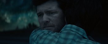 Movie still from “The Shack” (2017), directed by Stuart Hazeldine – A person wearing a plaid shirt; Close Up shot, Over the shoulder angle