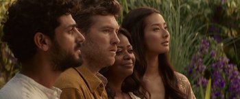 Movie still from “The Shack” (2017), directed by Stuart Hazeldine – A group of people standing next to each other in a field; Close Up shot, Low angle