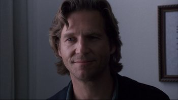 Movie still from “Fearless” (1993), directed by Peter Weir – A person with long hair; Close Up shot, Over the shoulder angle