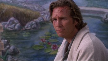 Movie still from “Fearless” (1993), directed by Peter Weir – A person wearing a white robe; Close Up shot, Low angle