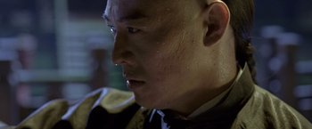 Movie still from “Fearless” (2006), directed by Ronny Yu – A man's face with water droplets on his face; Close Up shot, Low angle