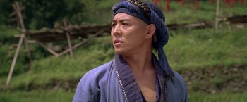 Movie still from “Fearless” (2006), directed by Ronny Yu – A man in a blue robe and a blue turban; Close Up shot, Low angle