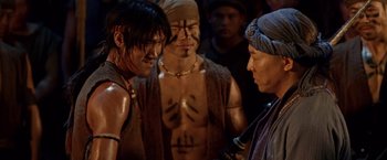 Movie still from “Fearless” (2006), directed by Ronny Yu – A group of men standing next to each other; Medium shot, Over the shoulder angle