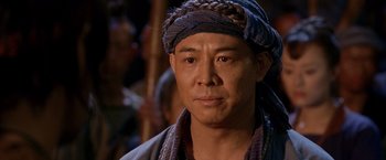 Movie still from “Fearless” (2006), directed by Ronny Yu – A person wearing a turban; Close Up shot, Over the shoulder angle