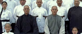 Movie still from “Fearless” (2006), directed by Ronny Yu – A group of men standing next to each other in front of each other; Medium shot, High angle