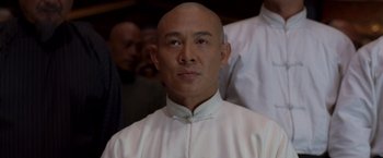 Movie still from “Fearless” (2006), directed by Ronny Yu – A man with a shaved head and a bald head; Close Up shot, Low angle