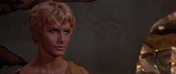 Movie still from “Fellini Satyricon” (1969), directed by Federico Fellini – A man's face in a movie scene; Close Up shot, High angle