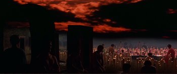 Movie still from “Fellini Satyricon” (1969), directed by Federico Fellini – A group of people standing in front of a field; Extreme Wide shot, High angle