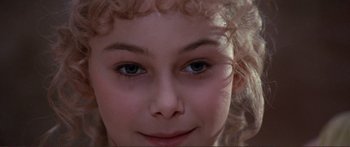 Movie still from “Fellini Satyricon” (1969), directed by Federico Fellini – A woman's eyes and hair; Extreme Close Up shot, High angle