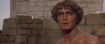 Movie still from “Fellini Satyricon” (1969), directed by Federico Fellini – A man's face in a movie scene; Close Up shot, Over the shoulder angle
