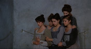 Movie still from “Fellini's Casanova” (1976), directed by Federico Fellini – A group of young women standing next to each other; Medium shot, Overhead angle
