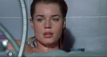 Movie still from “Femme Fatale” (2002), directed by Brian De Palma – A beautiful young lady taking a bath in a bath tub; Close Up shot, Overhead angle