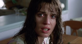 Movie still from “Femme Fatale” (2002), directed by Brian De Palma – A person with wet hair; Close Up shot, Low angle