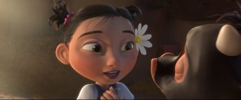 Movie still from “Ferdinand” (2017), directed by Carlos Saldanha – An animated girl with a flower in her hair; Close Up shot, Over the shoulder angle