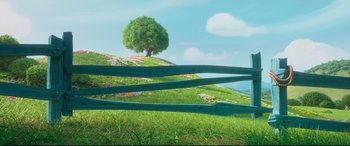 Movie still from “Ferdinand” (2017), directed by Carlos Saldanha – A tree on top of a grassy hill with flowers; Extreme Wide shot, Low angle
