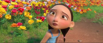 Movie still from “Ferdinand” (2017), directed by Carlos Saldanha – An animated girl is standing in front of flowers; Close Up shot, Over the shoulder angle
