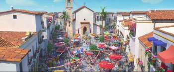 Movie still from “Ferdinand” (2017), directed by Carlos Saldanha – An aerial view of a crowd of people walking around a street; Extreme Wide shot, High angle