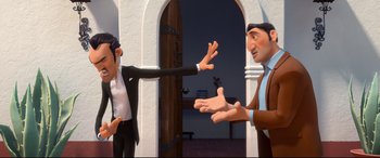 Movie still from “Ferdinand” (2017), directed by Carlos Saldanha – Two animated people are reaching out to shake hands; Medium shot, Over the shoulder angle