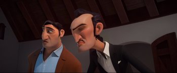 Movie still from “Ferdinand” (2017), directed by Carlos Saldanha – Two animated men in suits looking at each other; Close Up shot, Low angle
