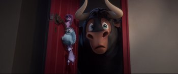 Movie still from “Ferdinand” (2017), directed by Carlos Saldanha – A stuffed animal and a stuffed animal sitting next to a bull; Medium shot, Low angle
