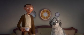 Movie still from “Ferdinand” (2017), directed by Carlos Saldanha – A man standing next to a dog in front of a wall; Medium shot, Over the shoulder angle