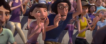 Movie still from “Ferdinand” (2017), directed by Carlos Saldanha – A couple of people standing next to each other on a street; Medium shot, Low angle