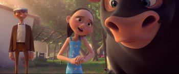 Movie still from “Ferdinand” (2017), directed by Carlos Saldanha – A woman standing next to an animal in a field; Medium shot, Over the shoulder angle