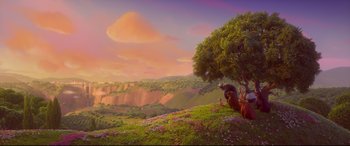 Movie still from “Ferdinand” (2017), directed by Carlos Saldanha – A painting of a tree and a horse on a hill; Extreme Wide shot, Low angle